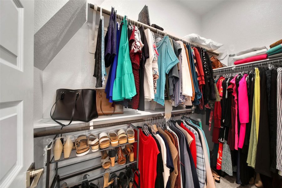 Exceptional primary suite storage includes two generous closets plus a separate linen closet.