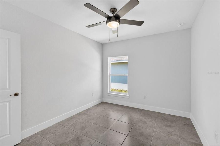 Spacious, unfurnished interior of a new home in , Port Charlotte (Image 27).