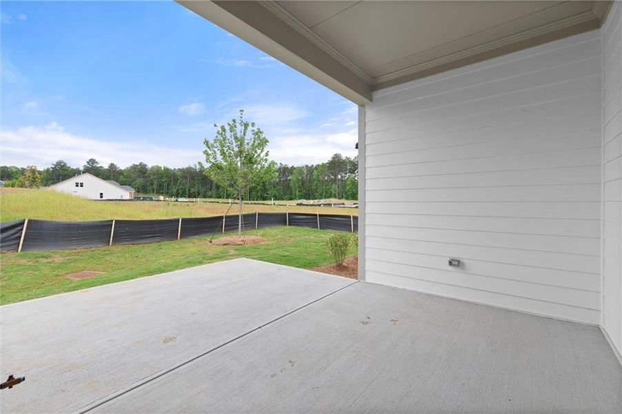 Exterior details and patio area of a home in The Reserve at Bells Ferry, Kennesaw (Image 27).
