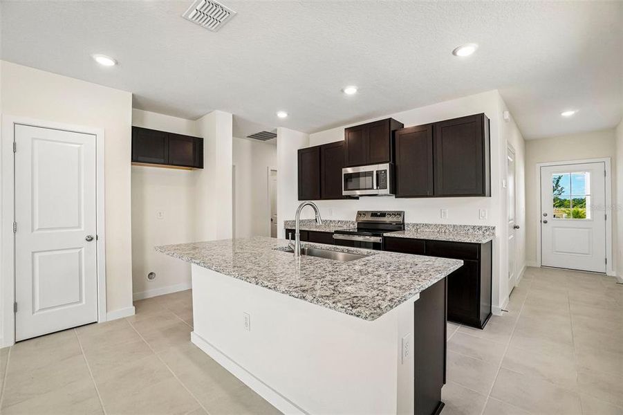 Furnished interior view inside a new home in Willowbrook North, Winter Haven (Image 12). Furnished interior view inside a new home in Willowbrook North, Winter Haven (Image 12).