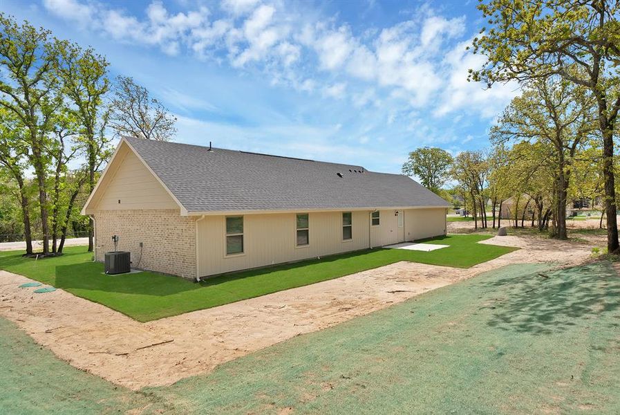 Exterior details and patio area of a home in , Poolville (Image 4).