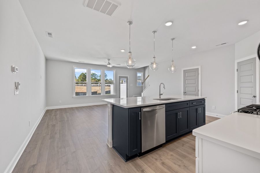 Representative furnished interior of a home built from the The Hemlock by RobuckHomes in Kennebec Crossing, Angier (Image 7).