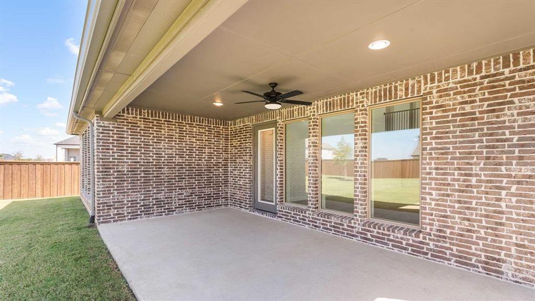 Exterior details and patio area of a home in Mosaic 50', Celina (Image 2).