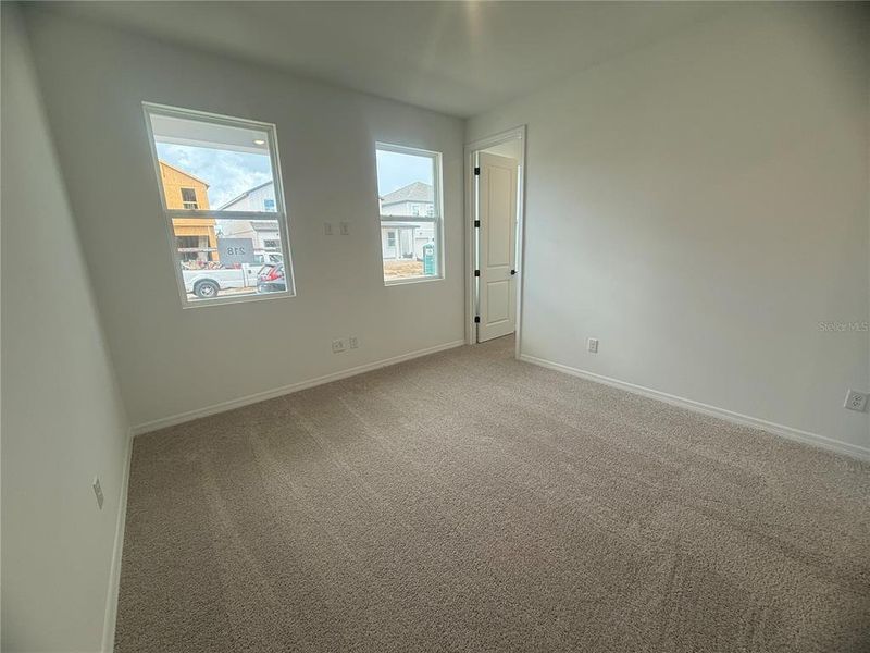 Spacious, unfurnished interior of a new home in Northlake Classical, Winter Garden (Image 30).