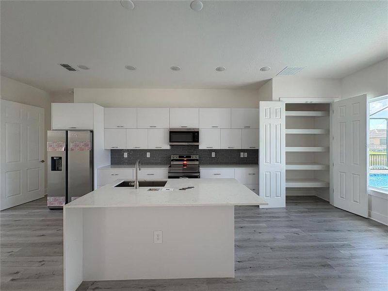 Furnished interior view inside a new home in , Port Charlotte (Image 5). Furnished interior view inside a new home in , Port Charlotte (Image 5).