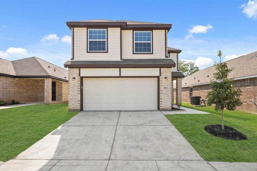 Front exterior of a new home in Christian Meadows, Ennis, TX, highlighting curb appeal (Image 14). Front exterior of a new home in Christian Meadows, Ennis, TX, highlighting curb appeal (Image 14).