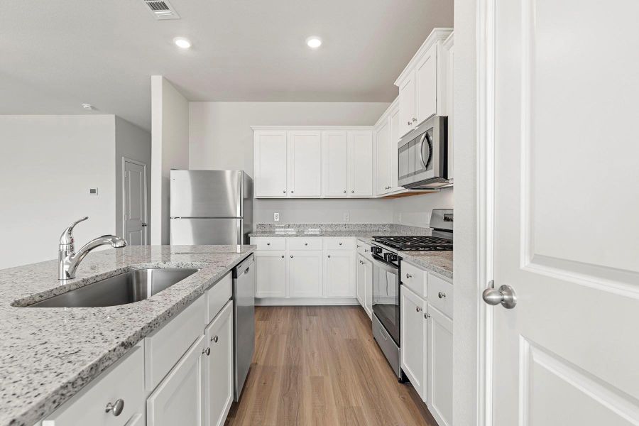 Furnished interior view inside a new home in Emberly, Beasley (Image 5).