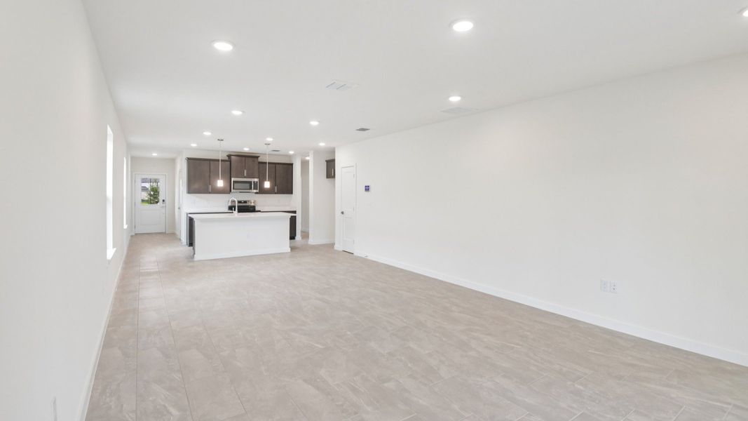 Furnished interior view inside a new home in Grasslands West, Lakeland (Image 9).