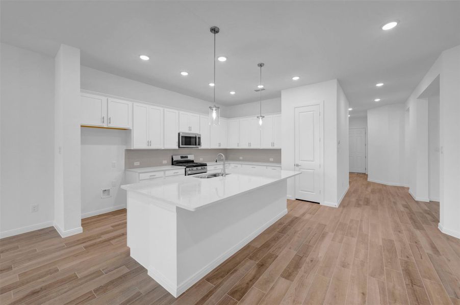 Furnished interior view inside a new home in Meridiana - Terrace Collection, Manvel (Image 5).