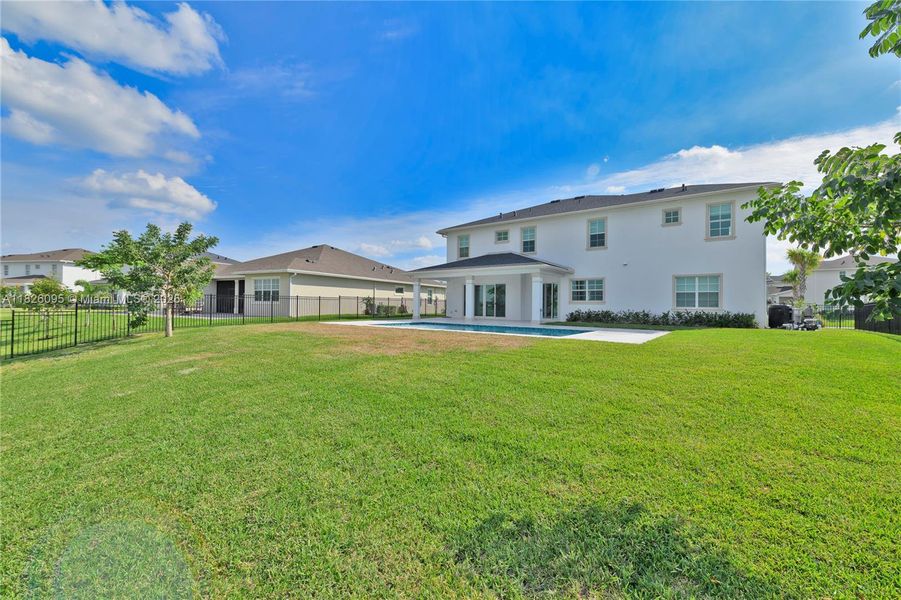 Exterior details and patio area of a home in Arden: The Waterford Collection, Loxahatchee (Image 38).