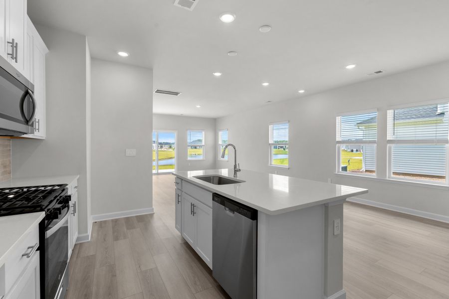 Furnished interior view inside a new home in Cypress Ridge - The Boardwalk Series, Longs (Image 7).