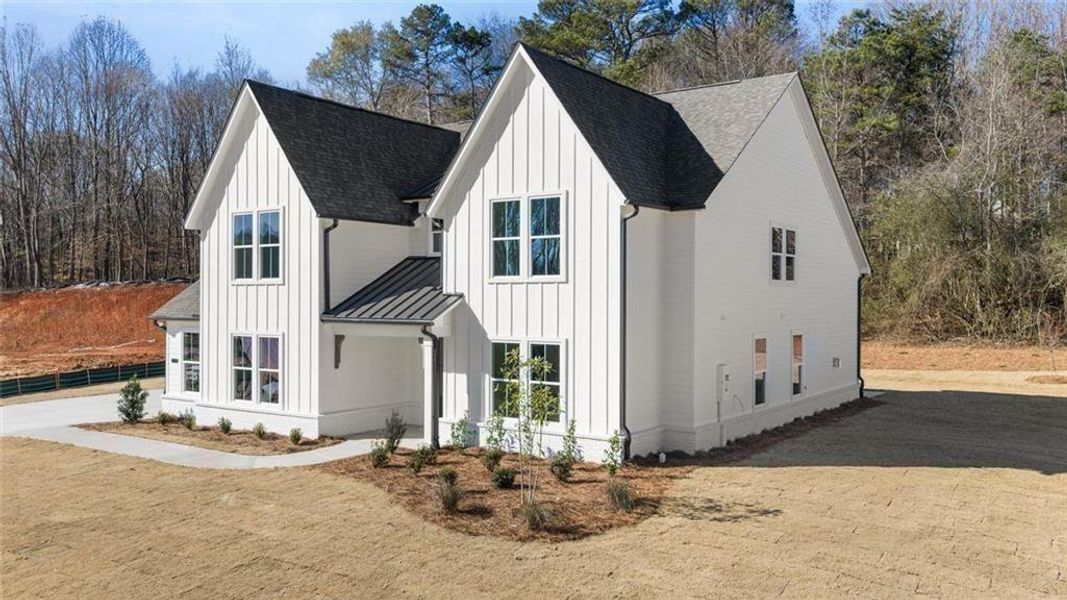 Front exterior of a new home in , Gainesville, GA, highlighting curb appeal (Image 28).