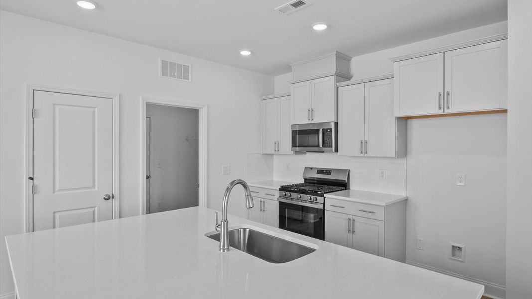 Representative furnished interior of a home built from the Freesia by DRB Homes in Essex Village, Franklinton (Image 13).
