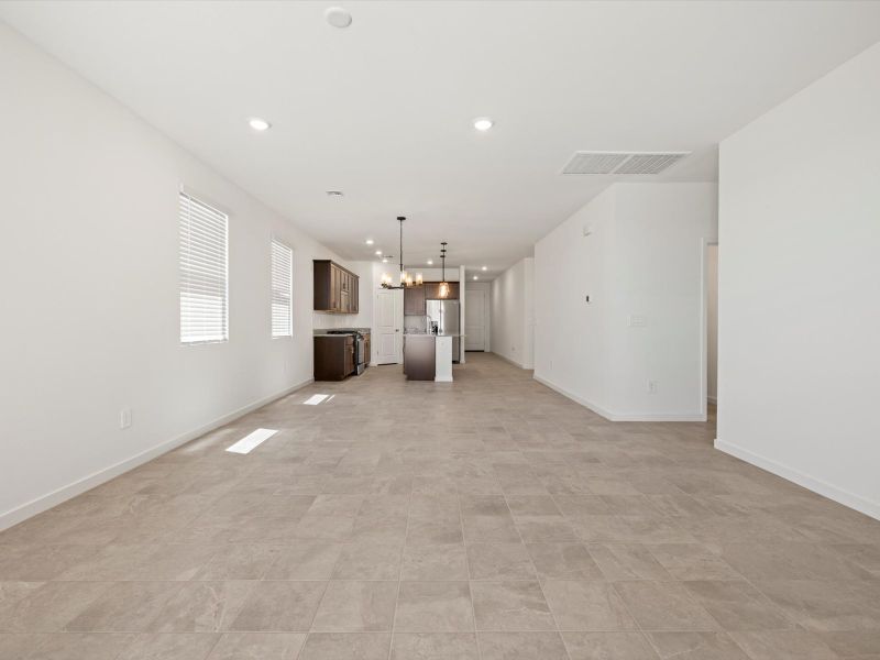 Spacious, unfurnished interior of a new home in Rancho Mirage Estate Series, Maricopa (Image 8).