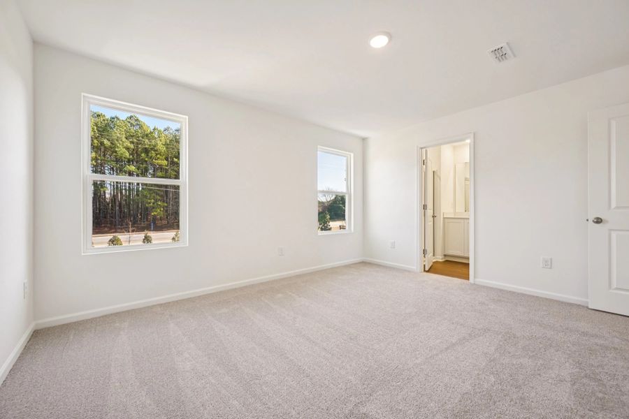 Spacious, unfurnished interior of a new home in Towns at Crescent Mills, Wilson's Mills (Image 25). Spacious, unfurnished interior of a new home in Towns at Crescent Mills, Wilson's Mills (Image 25).