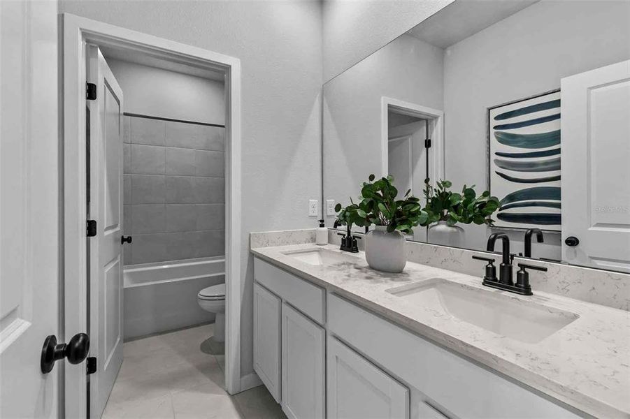 Furnished interior view inside a new home in The Cypress Series at Reserve East, Flagler Beach (Image 2).