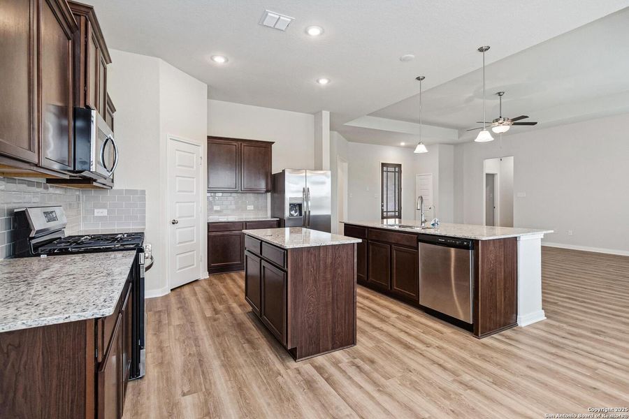 Furnished interior view inside a new home in Lonesome Dove, San Antonio (Image 6). Furnished interior view inside a new home in Lonesome Dove, San Antonio (Image 6).