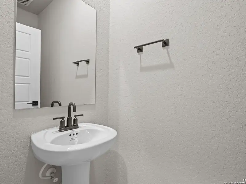 Close-up of interior finishes inside a home in Royal Crest, San Antonio (Image 11).