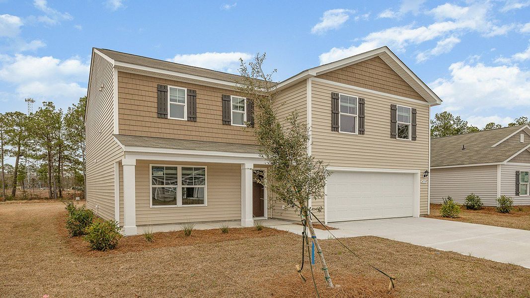 Front exterior of a new home in Sandridge Park, Little River, SC, highlighting curb appeal (Image 18).