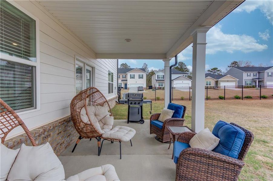 Exterior details and patio area of a home in Twin Lakes, Hoschton (Image 3).