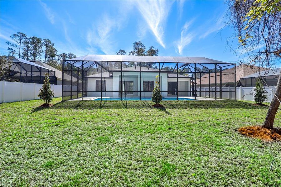 Front exterior of a new home in , Palm Coast, FL, highlighting curb appeal (Image 25). Front exterior of a new home in , Palm Coast, FL, highlighting curb appeal (Image 25).