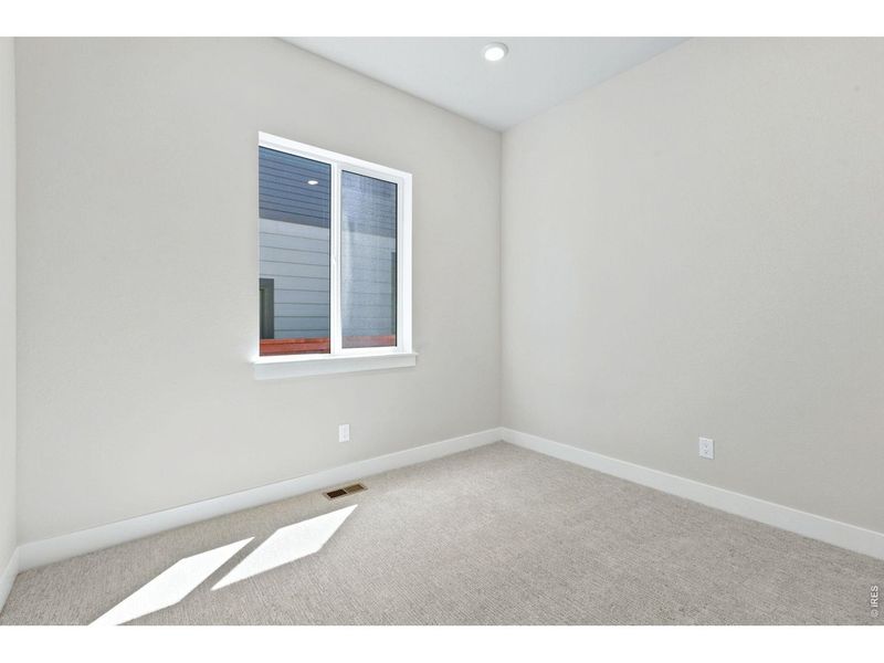Spacious, unfurnished interior of a new home in RainDance, Windsor (Image 6).