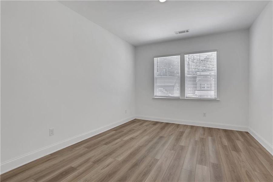 Spacious, unfurnished interior of a new home in Bailey Fence, Dacula (Image 37).