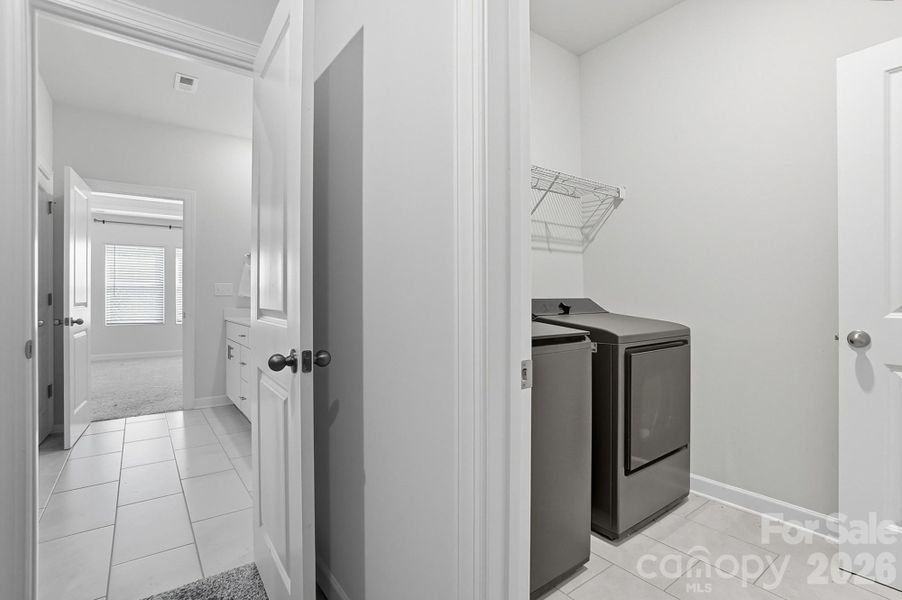 Furnished interior view inside a new home in Solena at the Vineyards II, Charlotte (Image 18).