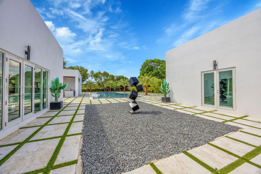 Front exterior of a new home in , Miami, FL, highlighting curb appeal (Image 36).