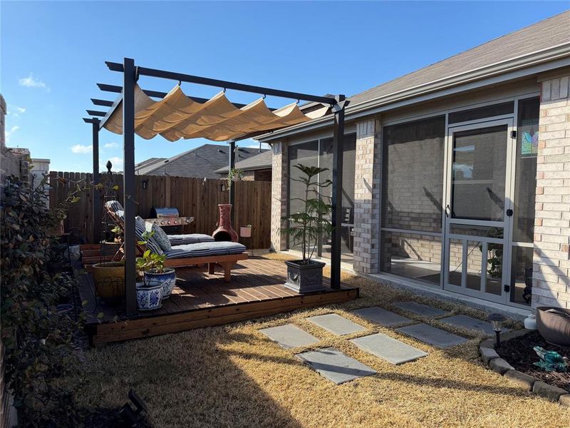 Step Outside to Enjoy Outdoor Living Space Which Includes Screened-In Porch, 10 x 12 Deck with Retractable Pergola Cover. Slide the Roof Closed to Create a Shady Retreat. Step Outside to Enjoy Outdoor Living Space Which Includes Screened-In Porch, 10 x 12 Deck with Retractable Pergola Cover. Slide the Roof Closed to Create a Shady Retreat.