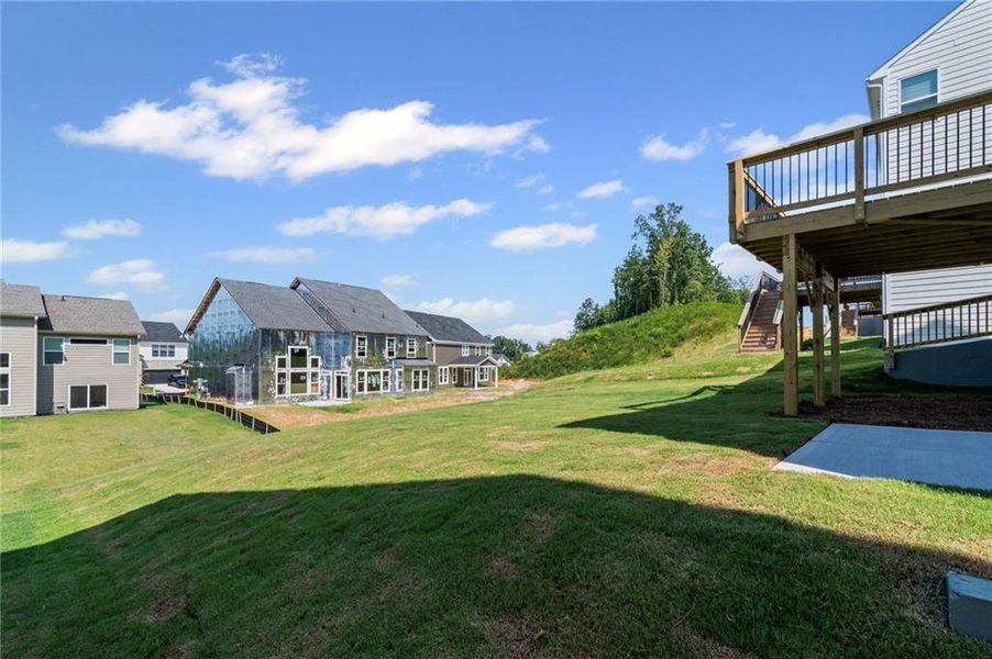 Front exterior of a new home in Twin Lakes, Braselton, GA, highlighting curb appeal (Image 20).