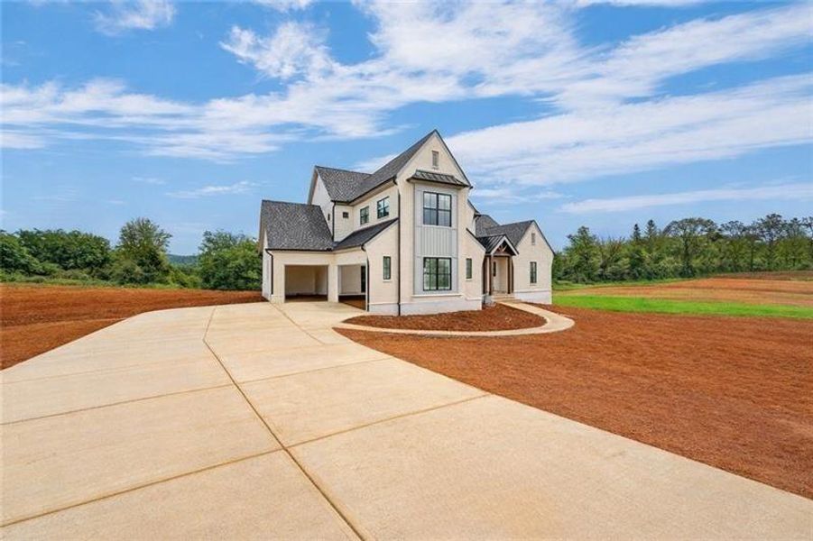Front exterior of a new home in , Rydal, GA, highlighting curb appeal (Image 13). Front exterior of a new home in , Rydal, GA, highlighting curb appeal (Image 13).