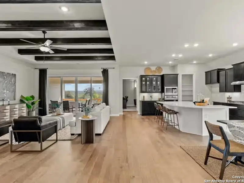 Furnished interior view inside a new home in Potranco Oaks, Castroville (Image 9).