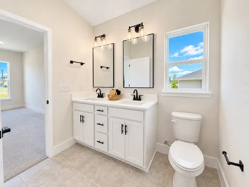 Furnished interior view inside a new home in St. John's Preserve, Palm Bay (Image 14).