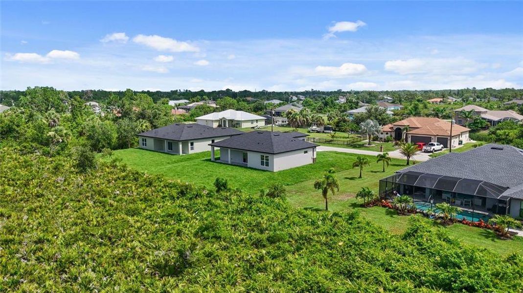Front exterior of a new home in , Port Charlotte, FL, highlighting curb appeal (Image 22).