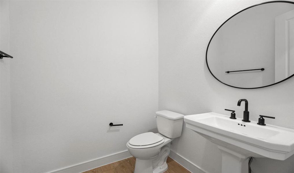 Half bath (*Photo not of actual home and used for illustration purposes only.) Half bath (*Photo not of actual home and used for illustration purposes only.)