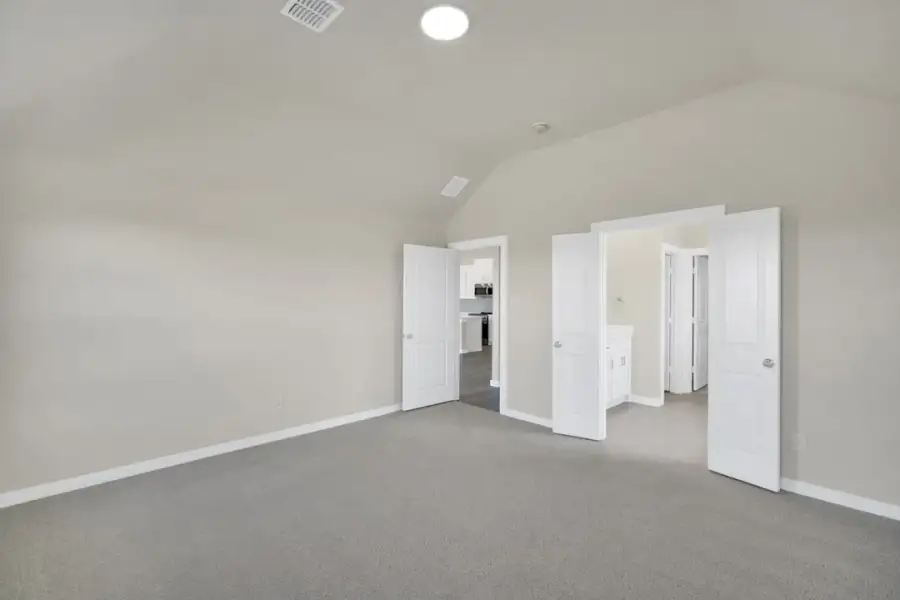 Representative unfurnished interior of a home built from the The Amherst by Lillian Custom Homes in Freeman Farm, Kaufman (Image 45).