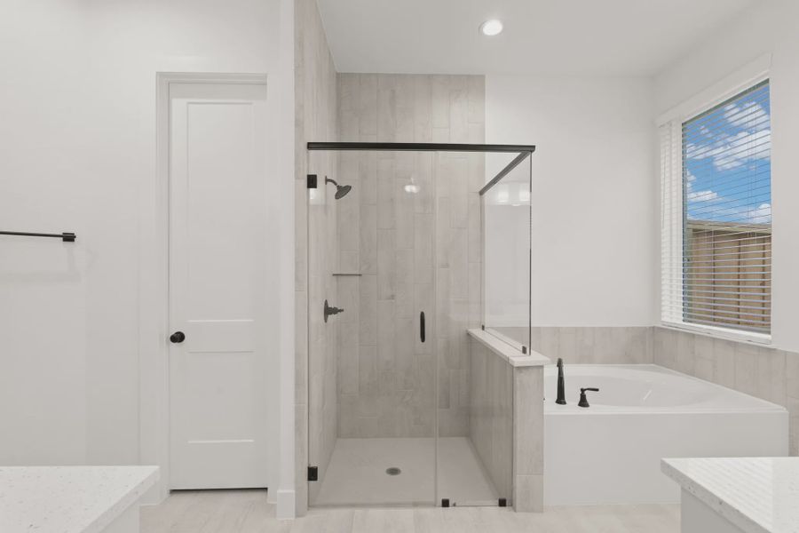 Representative furnished interior of a home built from the Palmer by Chesmar Homes in Riceland Alley Loads, Mont Belvieu (Image 15).