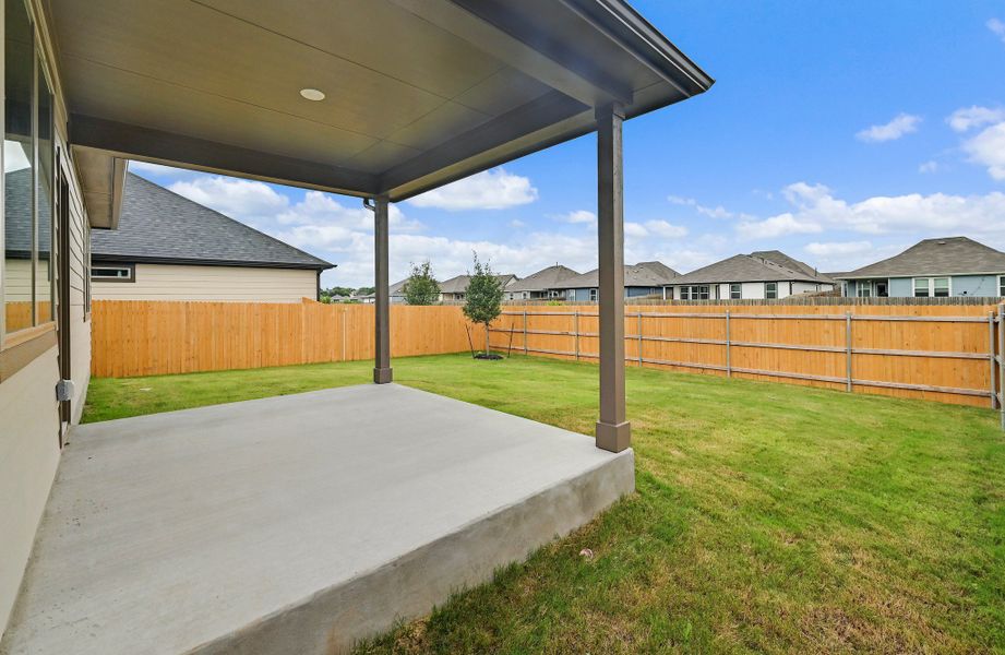 Exterior details and patio area of a home in Prairie Winds, Hutto (Image 3).