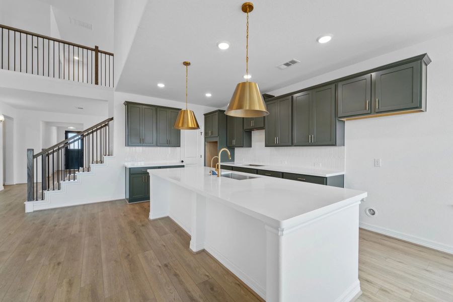 Kitchen. Note: Sample product photo. Actual exterior and interior selections may vary by homesite. Photo may be virtually staged