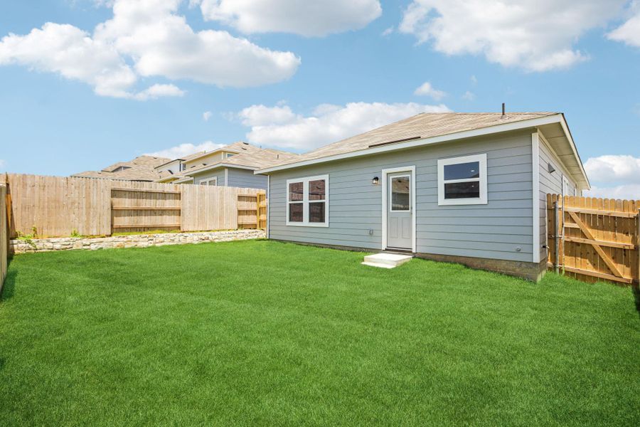 Exterior details and patio area of a home in Edgebrooke, Pflugerville (Image 20).
