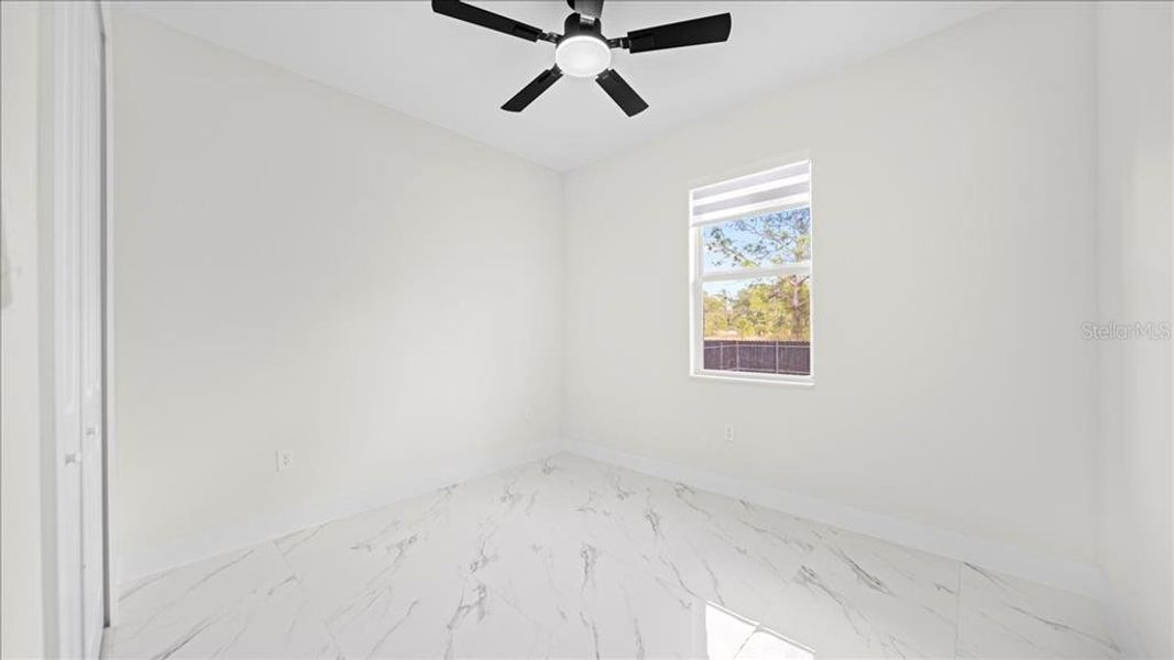 Spacious, unfurnished interior of a new home in , Port Charlotte (Image 19).