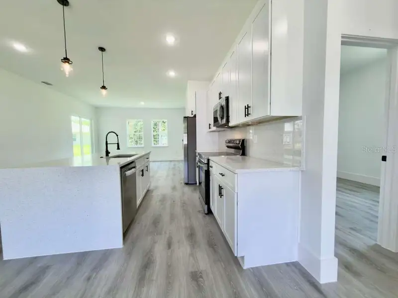 Furnished interior view inside a new home in , Ocala (Image 17).