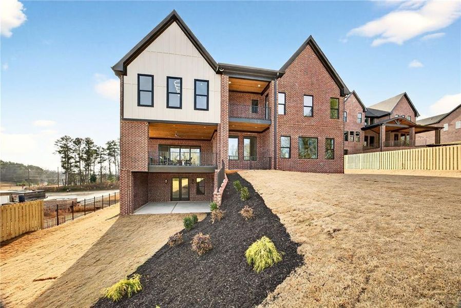 Front exterior of a new home in , Buford, GA, highlighting curb appeal (Image 30). Front exterior of a new home in , Buford, GA, highlighting curb appeal (Image 30).