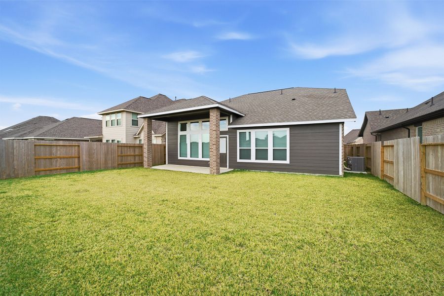 Exterior details and patio area of a home in Windrose Green, Angleton (Image 4). Exterior details and patio area of a home in Windrose Green, Angleton (Image 4).