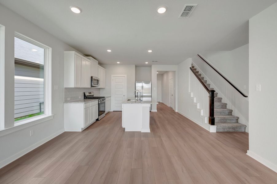 Furnished interior view inside a new home in Mason Woods, Cypress (Image 13).