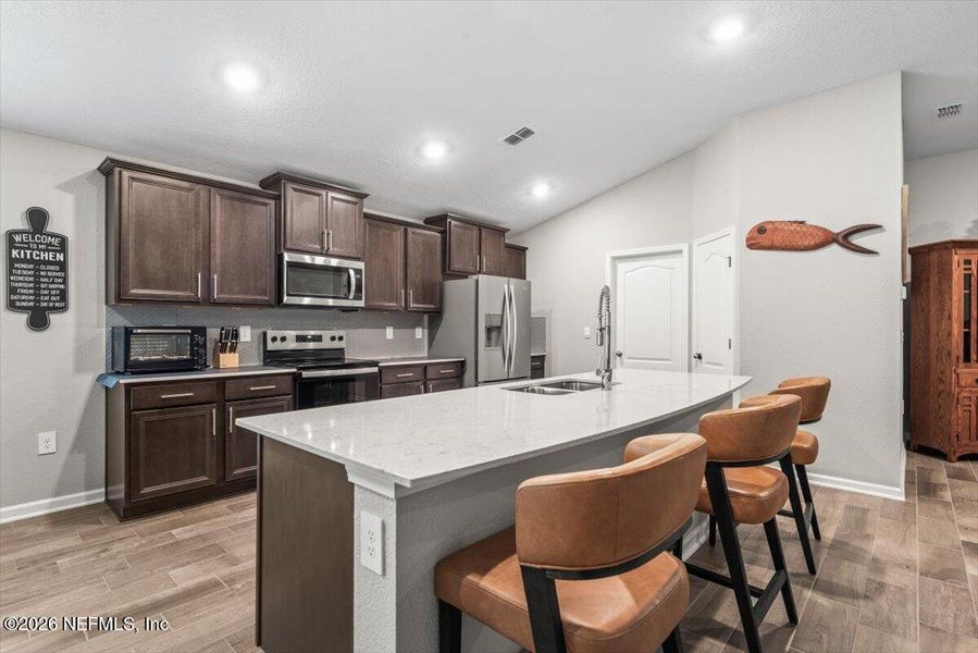 Furnished interior view inside a new home in Pecan Ridge, Jacksonville (Image 13).