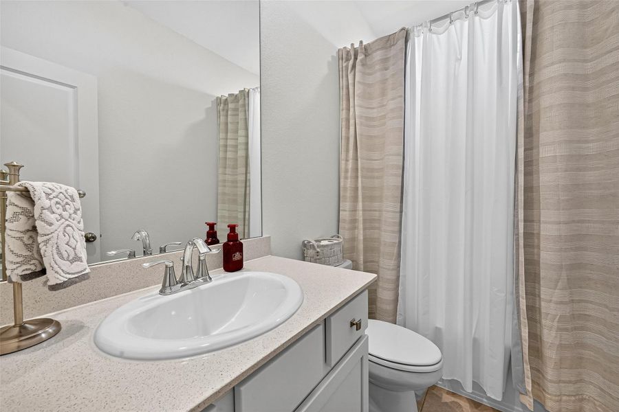 Luxurious upstairs en-suite bathroom for ultimate privacy and convenience. Luxurious upstairs en-suite bathroom for ultimate privacy and convenience.