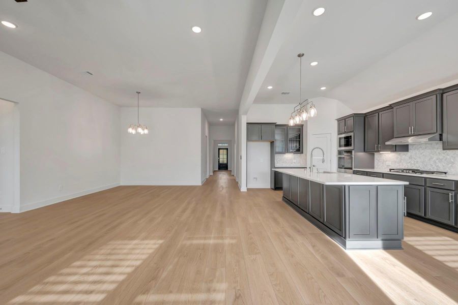 Furnished interior view inside a new home in The Oaks on 6th Street, Magnolia (Image 6).