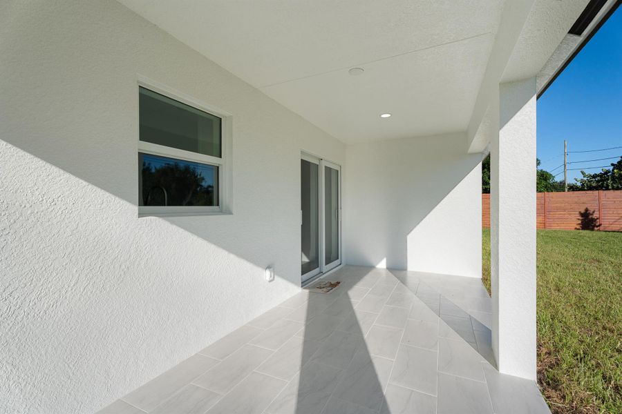 Exterior details and patio area of a home in , Port St. Lucie (Image 4). Exterior details and patio area of a home in , Port St. Lucie (Image 4).